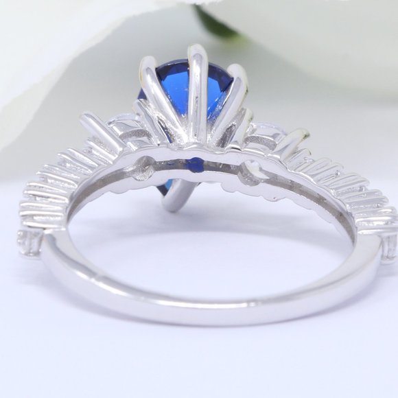 0.81 Carat Teardrop Pear Blue Sapphire Round Cubic - Picture 3 of 3